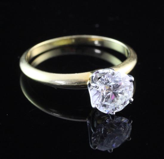 A Tiffany & Co 18ct gold and platinum solitaire diamond ring, size L.